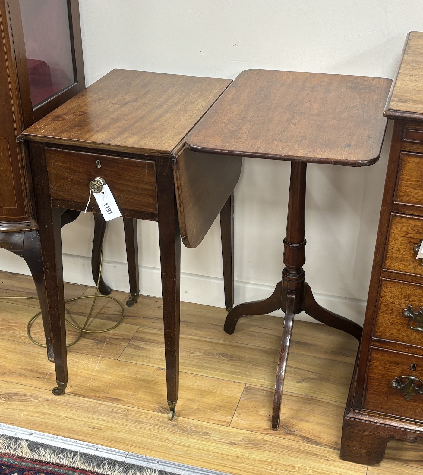 A George III mahogany drop leaf work table, width 33cm, depth 47cm, height 71cm and an early Victorian mahogany rectangular tripod wine table
